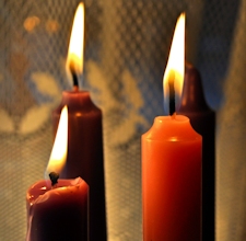Four Advent candles with the pink one in front