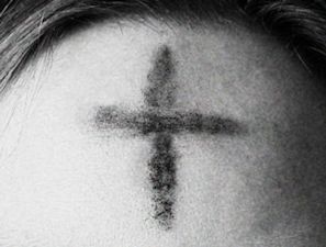 black and white image of ashes on forehead