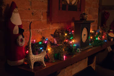 Christmas mantle display with Santa Claus