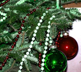 red and green Christmas bulbs on tree