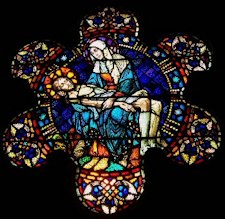 stain glass of the dead Christ with Mary